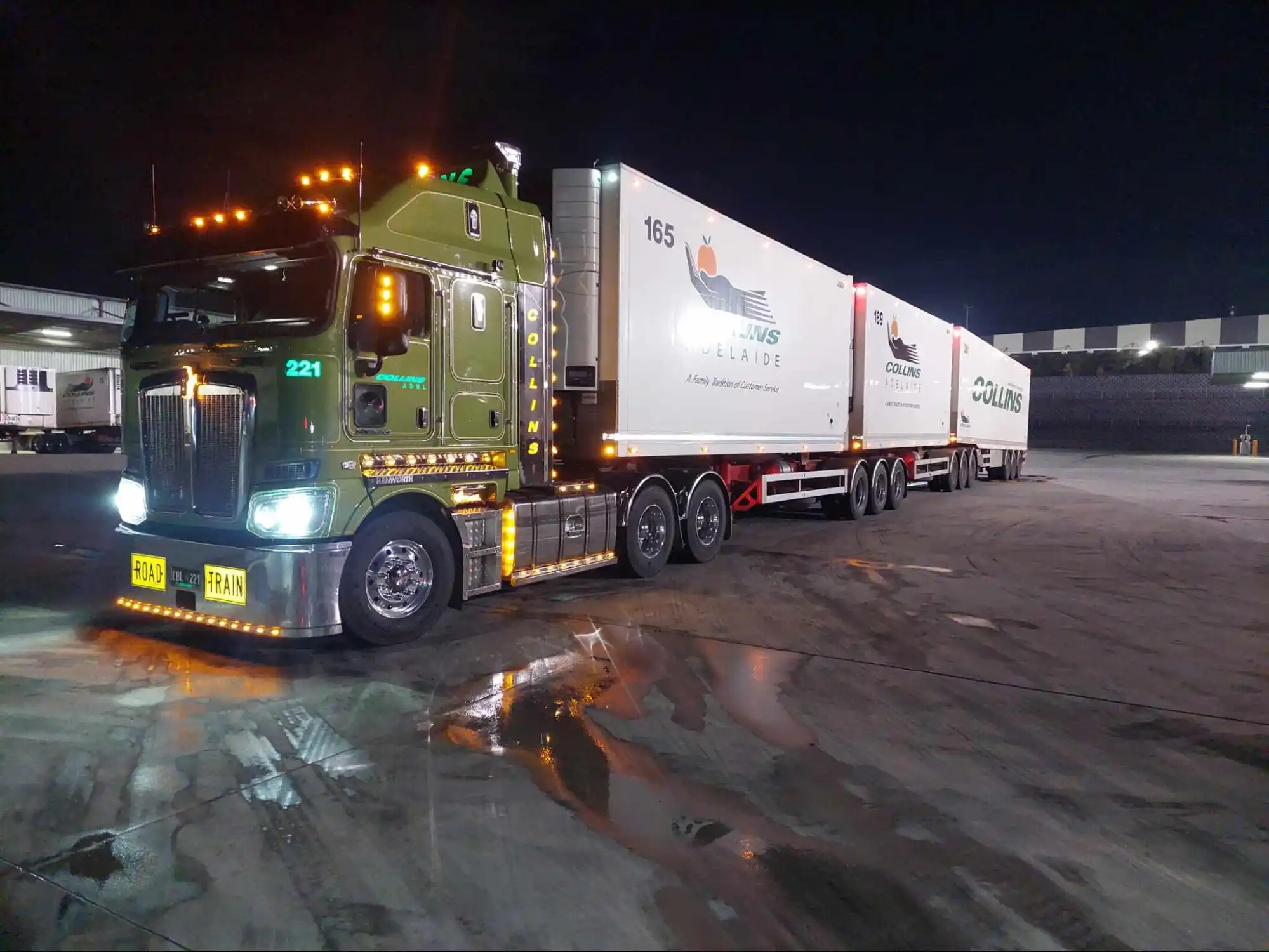 Logmaster Australia Parked Green and White Truck