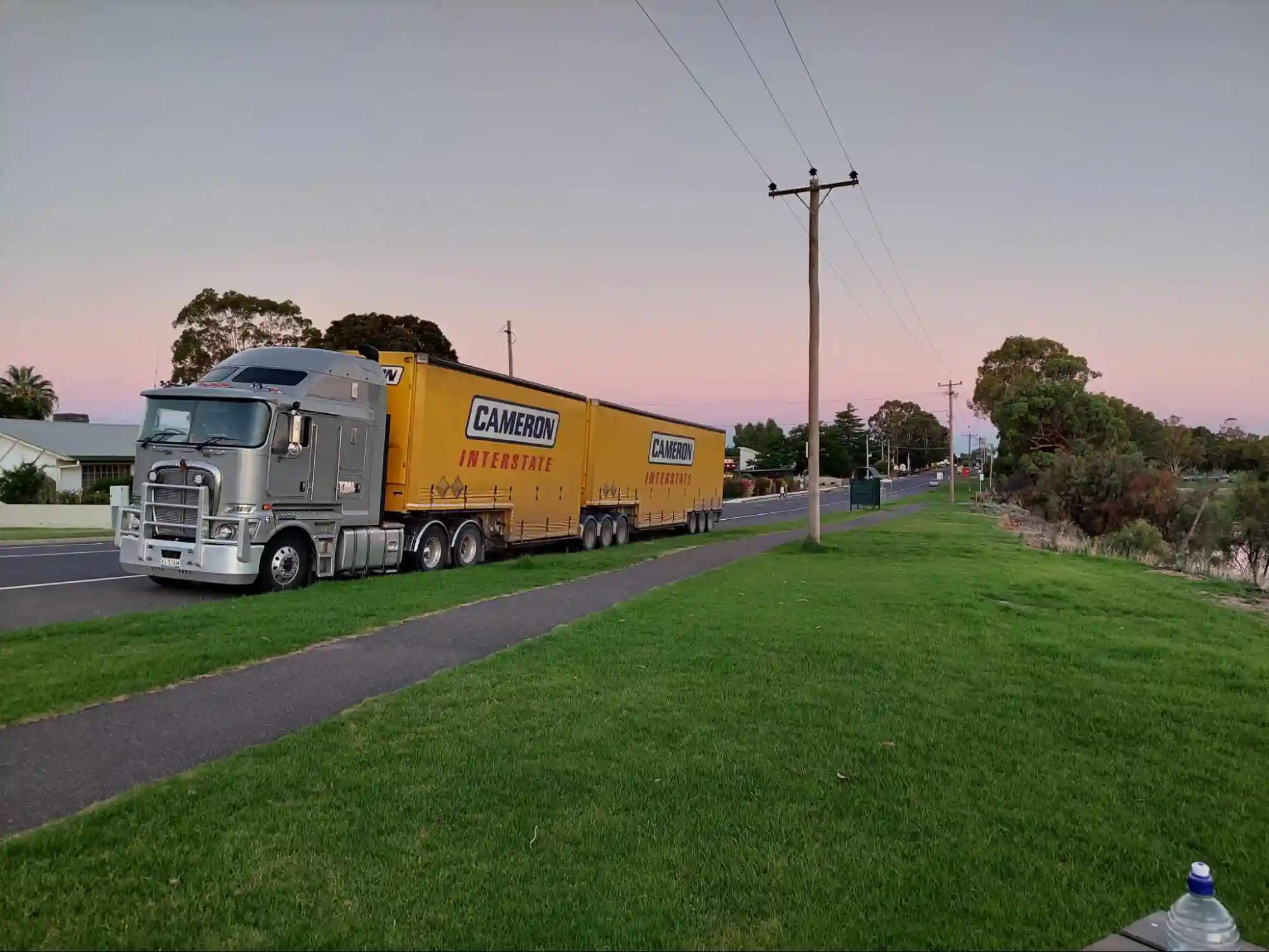 Logmaster Australia Parked Orange Truck